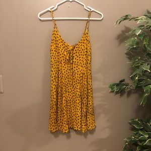 Yellow mini skater dress with black rose print